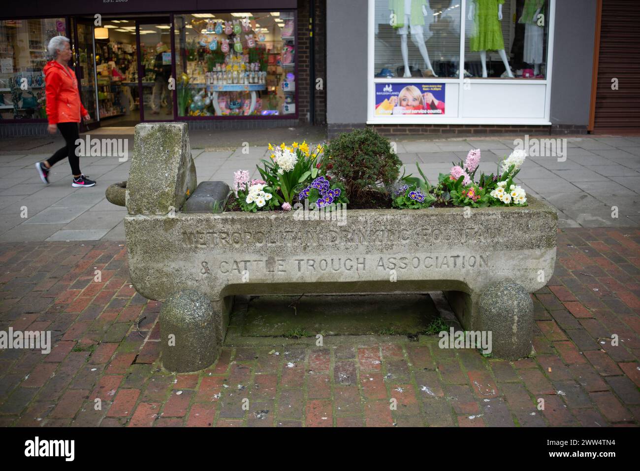 Cattle trough now a planter in the High Street, Rayleigh, Essex Stock Photo