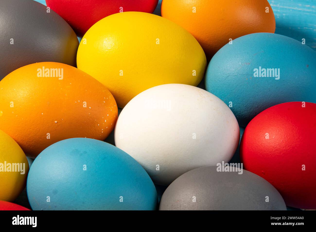 eggs painted in different colors to symbolize the passage of Christian