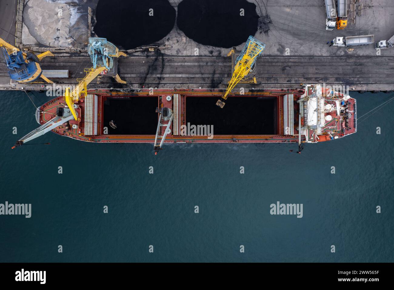 Aerial view to cargo ship on the port Stock Photo - Alamy