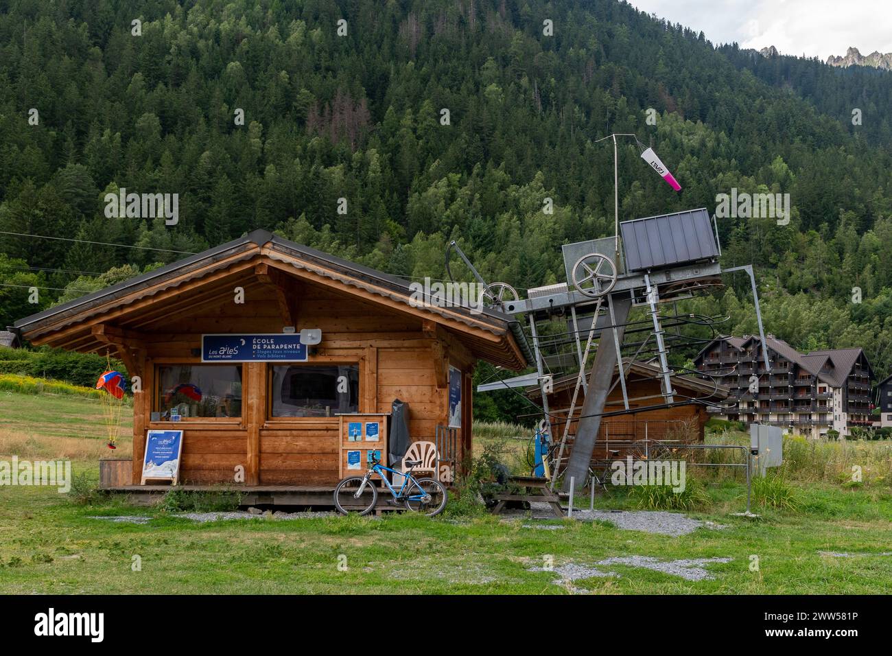 Chalet of a paragliding school and ski lift in the Savoy sport area of the alpine town in summer, Chamonix, Haute Savoie, Auvergne Rhone Alpes, France Stock Photo