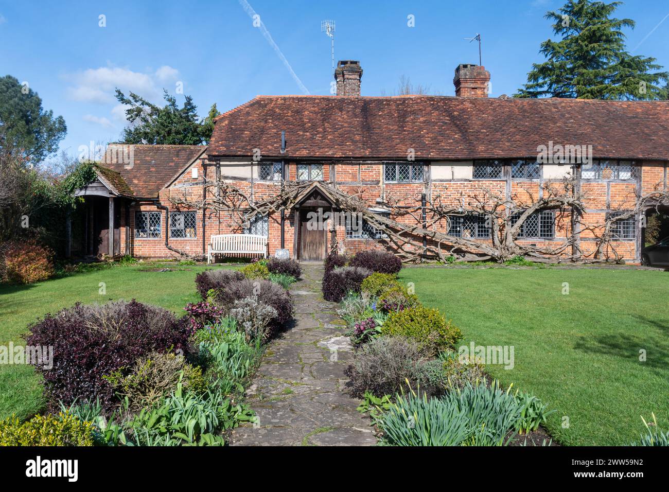 Pretty character cottage in Cranleigh, a Surrey village, England, UK, a grade II listed 17th century building Stock Photo
