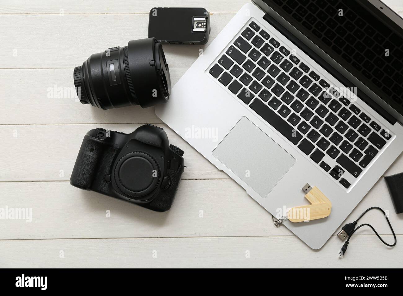 Composition with modern gadgets on light wooden background Stock Photo