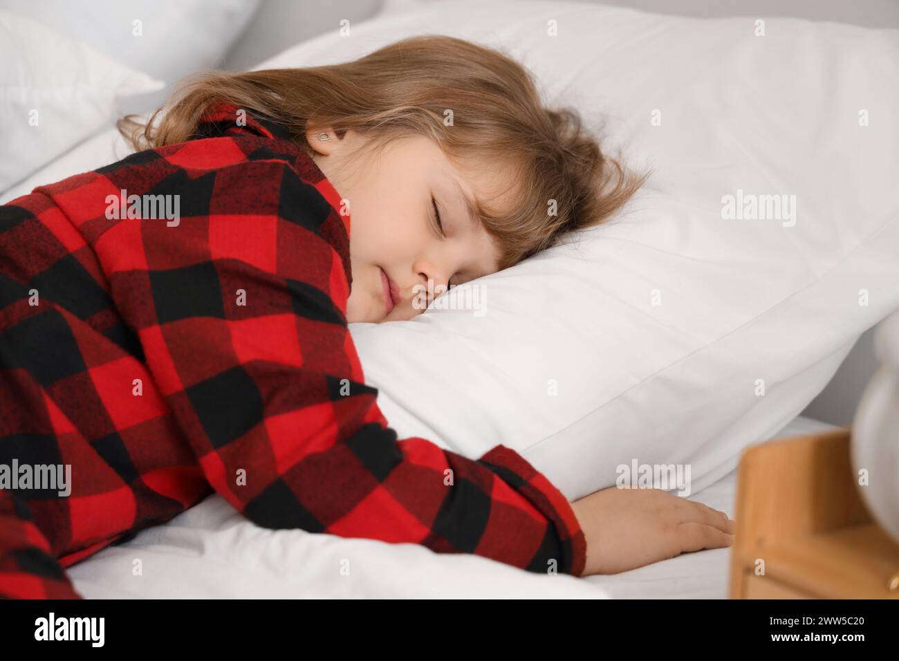 Adorable little girl sleeping in bed Stock Photo - Alamy