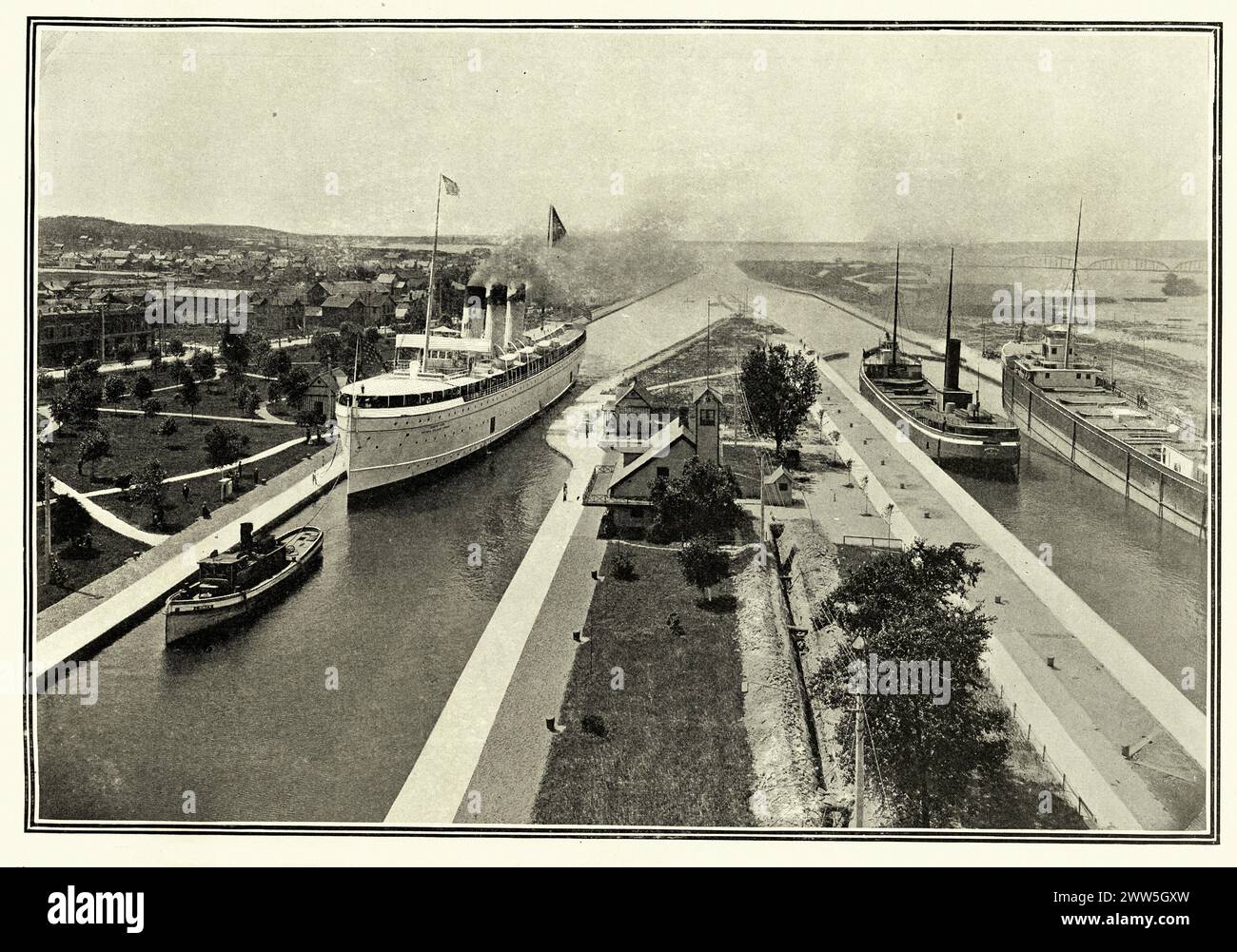 Vintage photograph of Ships passing through the Sault Ste. Marie Canal, Ontario, Canada, 1902 Stock Photo
