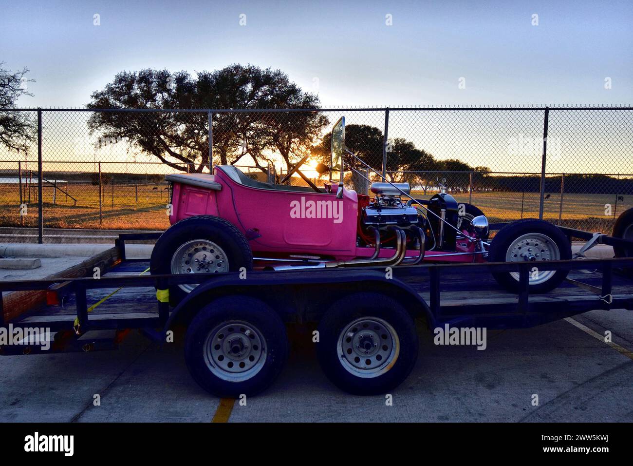 Panther pink T-bucket rat-rod, classic hot rod with straight pipe exhaust Stock Photo