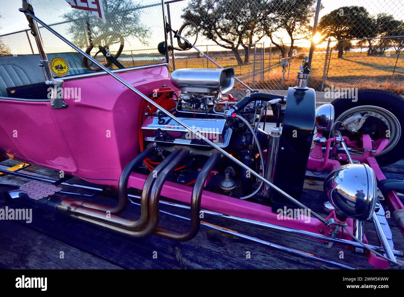 Panther pink T-bucket rat-rod, classic hot rod with straight pipe exhaust Stock Photo