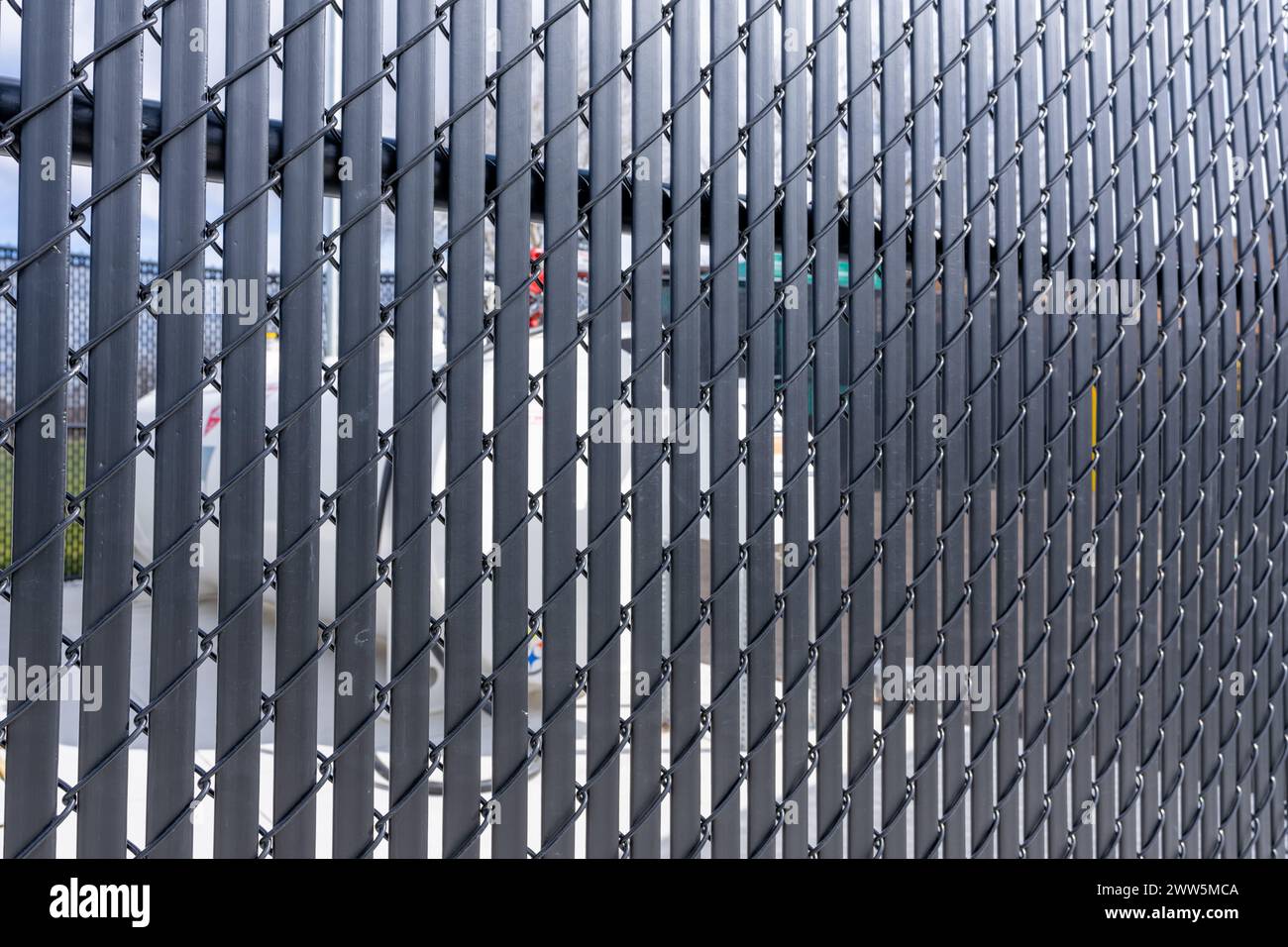 Black Vinyl Coated Chain Link Fence With Vertical Black Privacy Slats Black Vinyl Coated Chain Link Fence With Vertical Black Privacy Slats 2WW5MCA