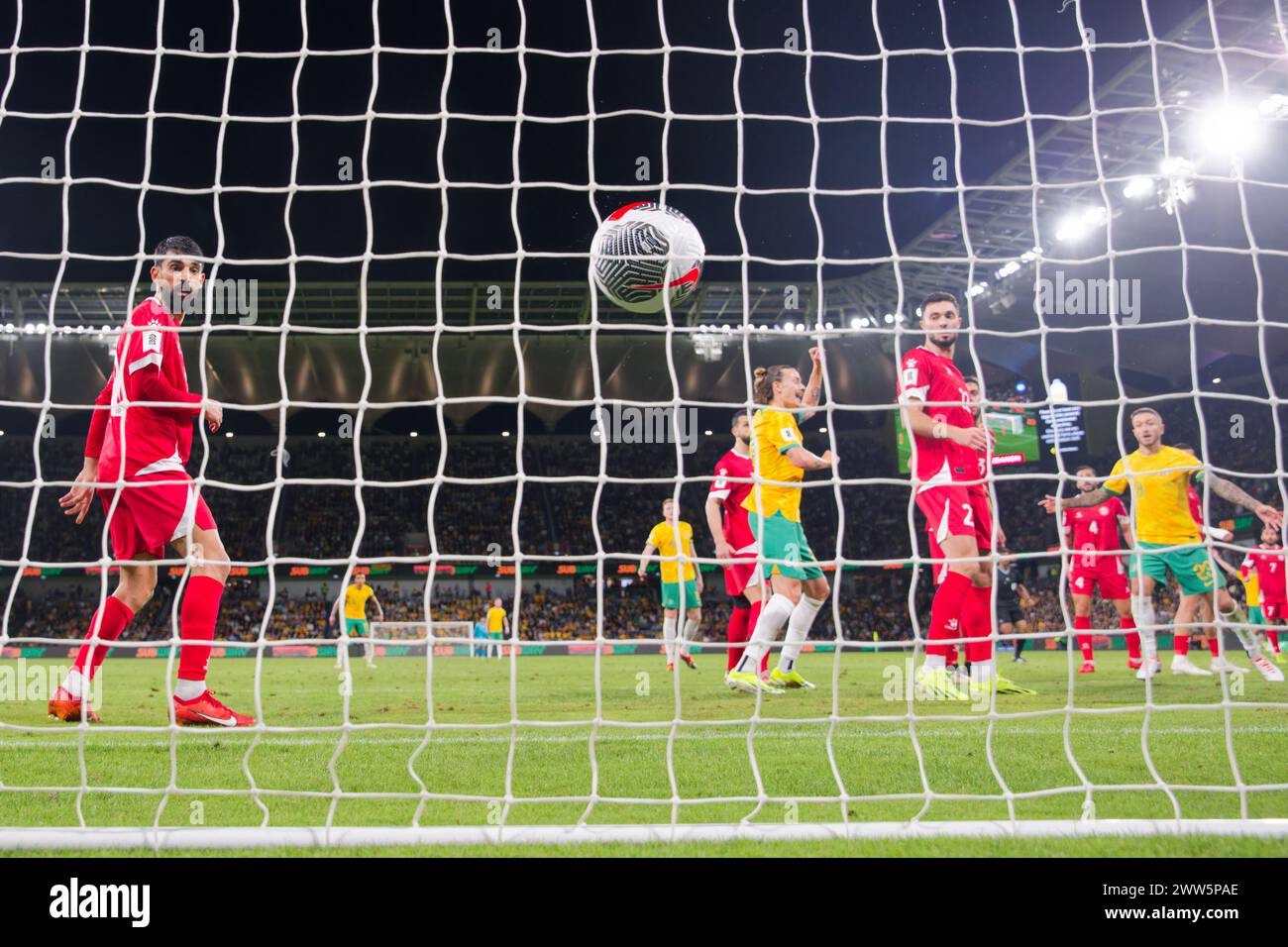 Sydney, Australia. 21st Mar, 2024. A goal is scored by Kyle Rowles of Australia as Lebanese players look on during the FIFA World Cup 2026 Qualifier match between Australia and Lebanon at Western Sydney Stadium on March 21, 2024 in Sydney, Australia Credit: IOIO IMAGES/Alamy Live News Stock Photo