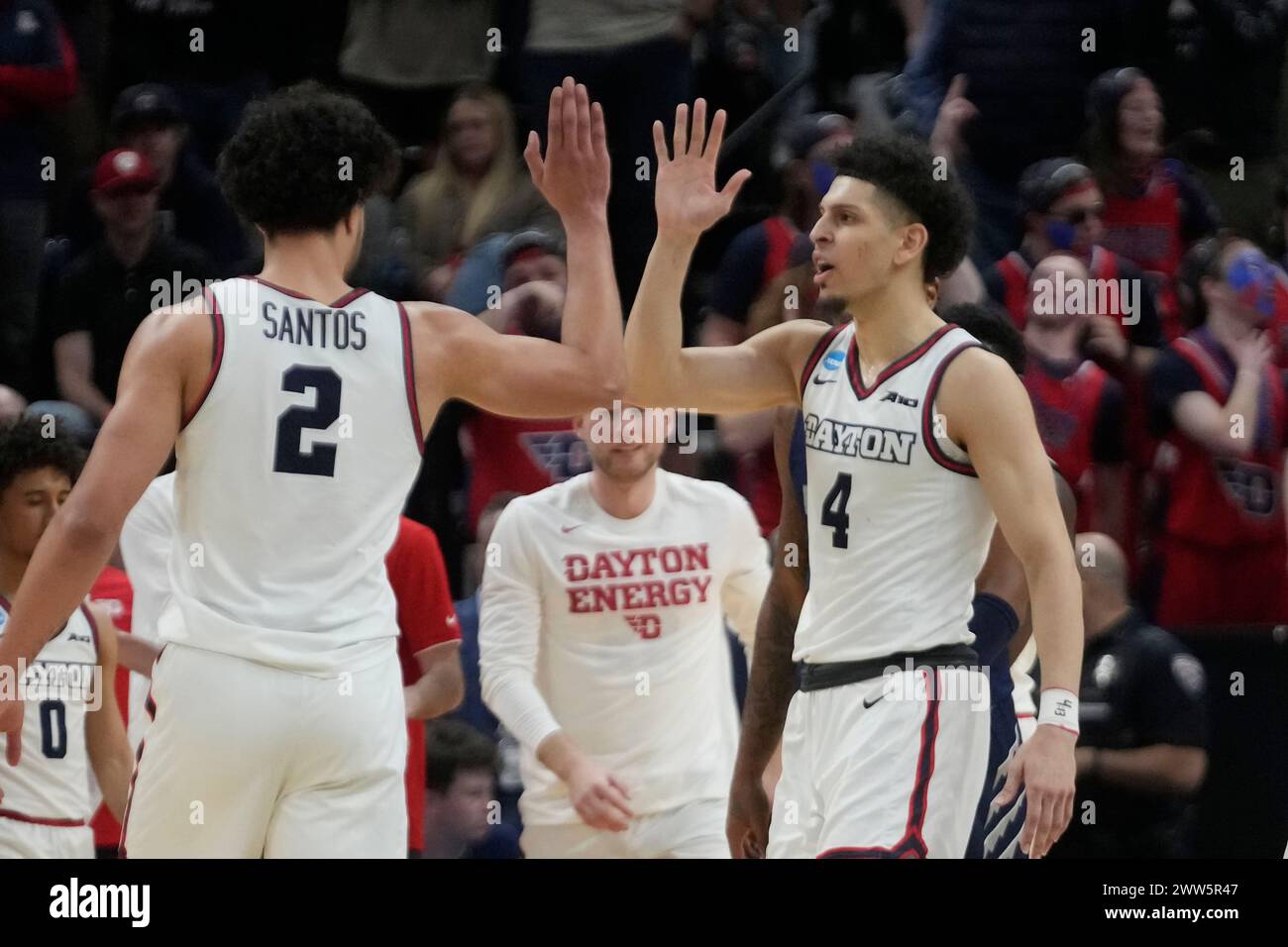 Dayton's Koby Brea (4) and Nate Santos (2) high-five during the second ...