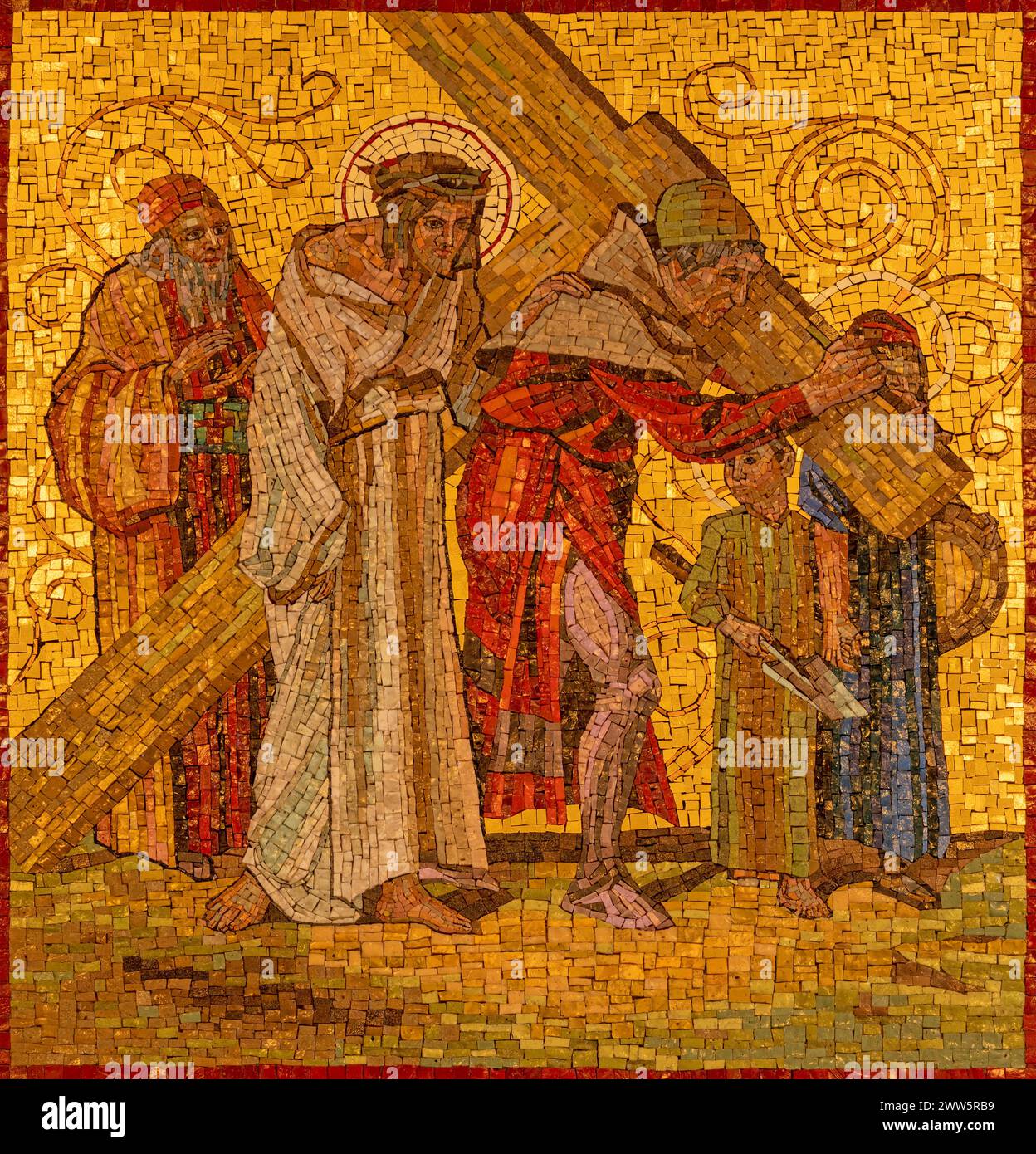 Milan - The mosaic  Simon of Cyrene helps Jesus carry the cross as part of Cross way station in the church Chiesa di San Agostino Stock Photo