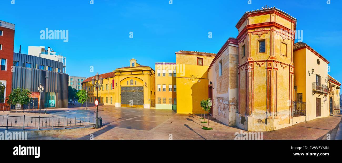 Panorama of historic Plaza Fray Alonso de Santo Tomas square with Congregation of Mena and Santo Domingo de Guzman churches, Malaga, Spain Stock Photo