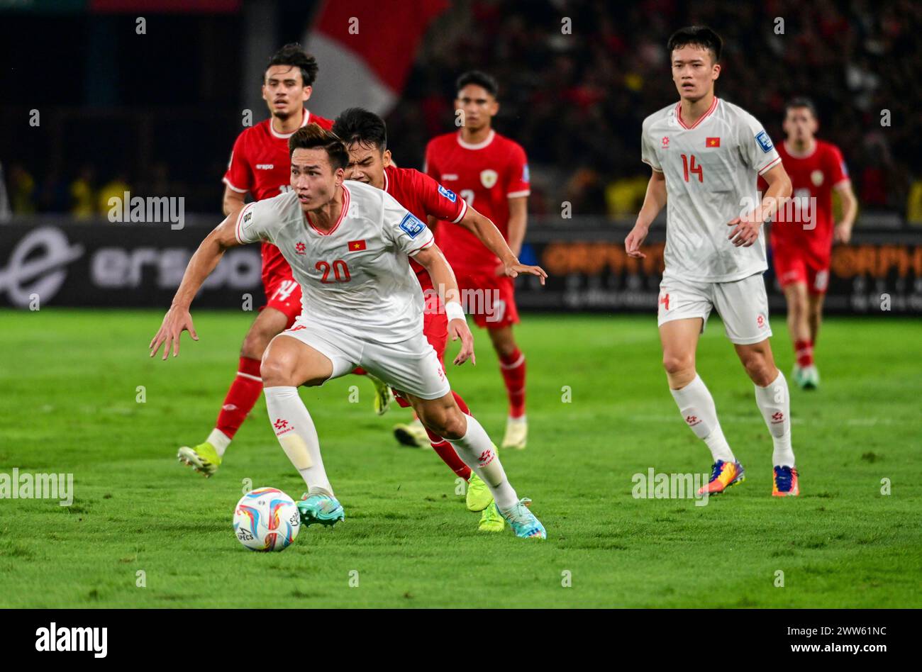 Jakarta, Indonesia. 21st Mar, 2024. Bui Hoang Viet Anh (front) of Vietnam dribbles during the 2026 FIFA World Cup Asian qualifier between Indonesia and Vietnam at Gelora Bung Karno Stadium in Jakarta, Indonesia, March 21, 2024. Credit: Zulkarnain/Xinhua/Alamy Live News Stock Photo