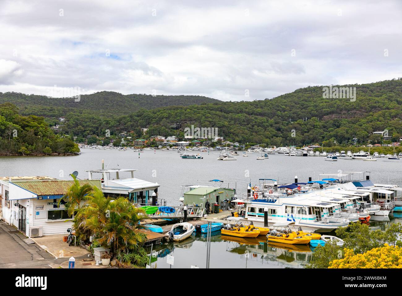 Kangaroo Point Cruise terminal in Brooklyn, central coast NSW, views across Hawkesbury River to  main Brooklyn town area, New South Wales, Australia Stock Photo