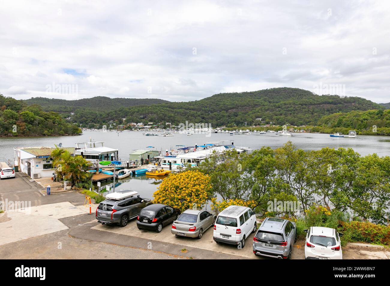 Kangaroo Point Cruise terminal in Brooklyn, central coast NSW, views across Hawkesbury River to  main Brooklyn town area, New South Wales, Australia Stock Photo