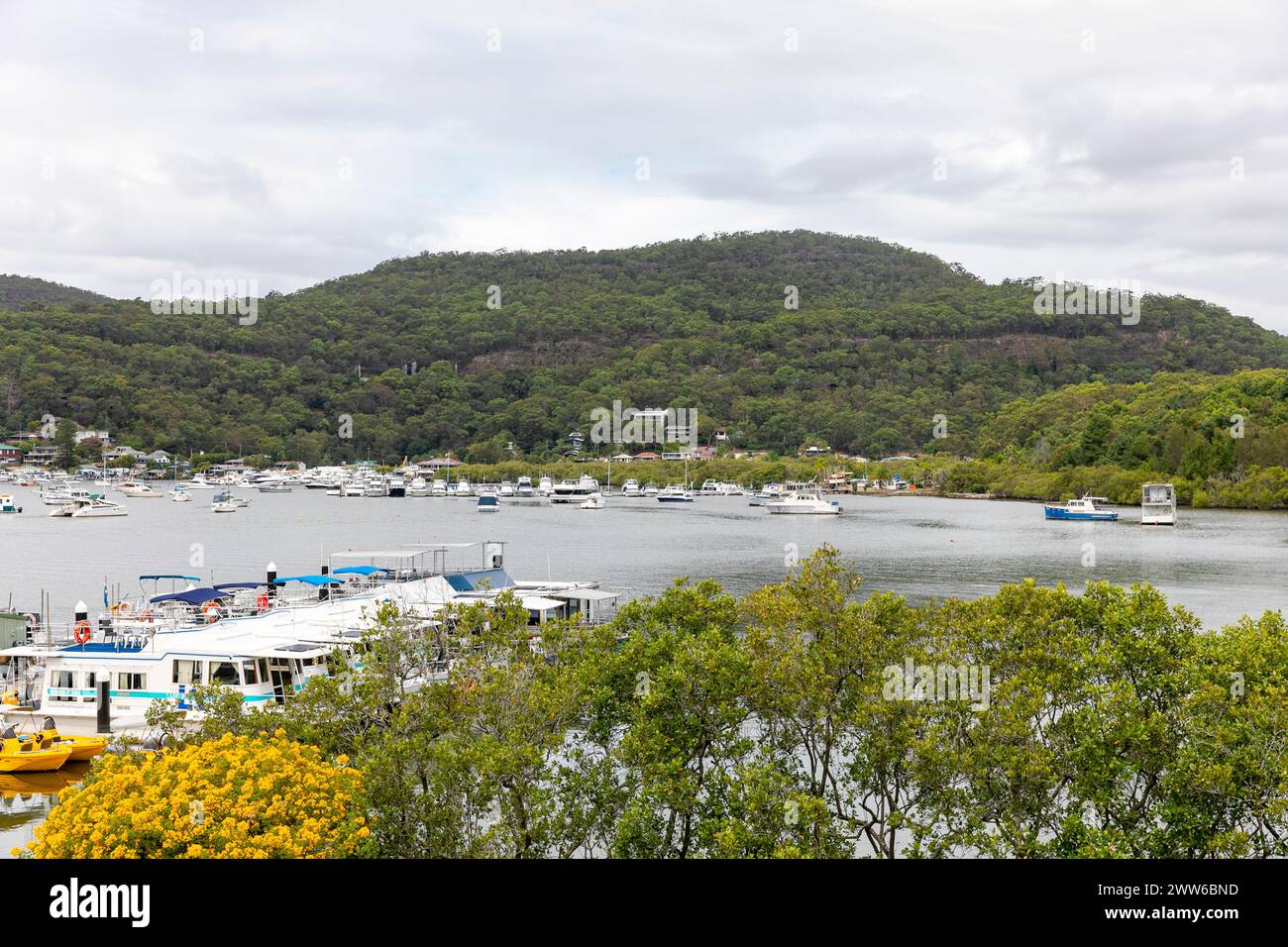 Kangaroo Point Cruise terminal in Brooklyn, central coast NSW, views across Hawkesbury River to  main Brooklyn town area, New South Wales, Australia Stock Photo