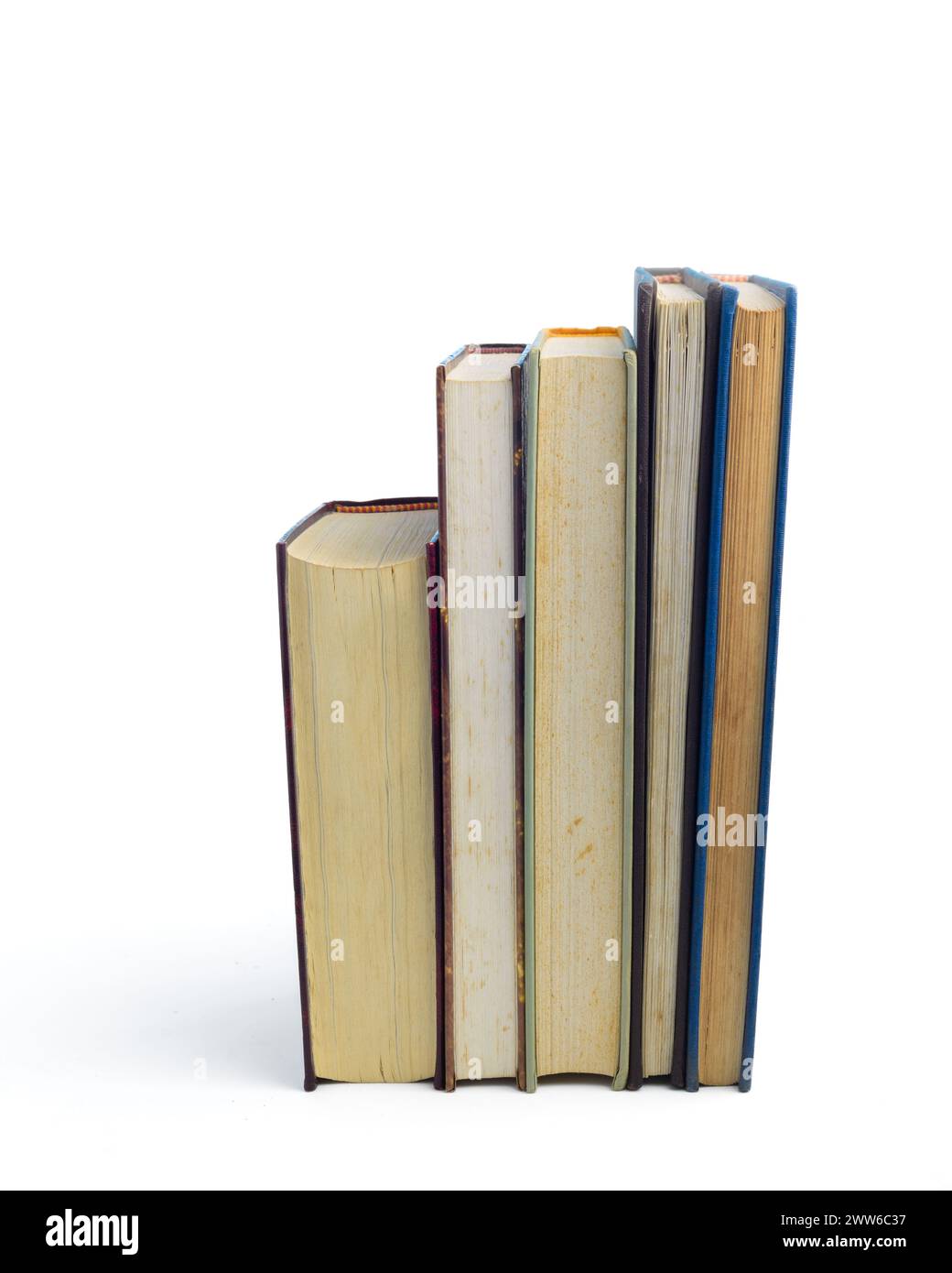 Pile of used books isolated on white background. World book day Stock
