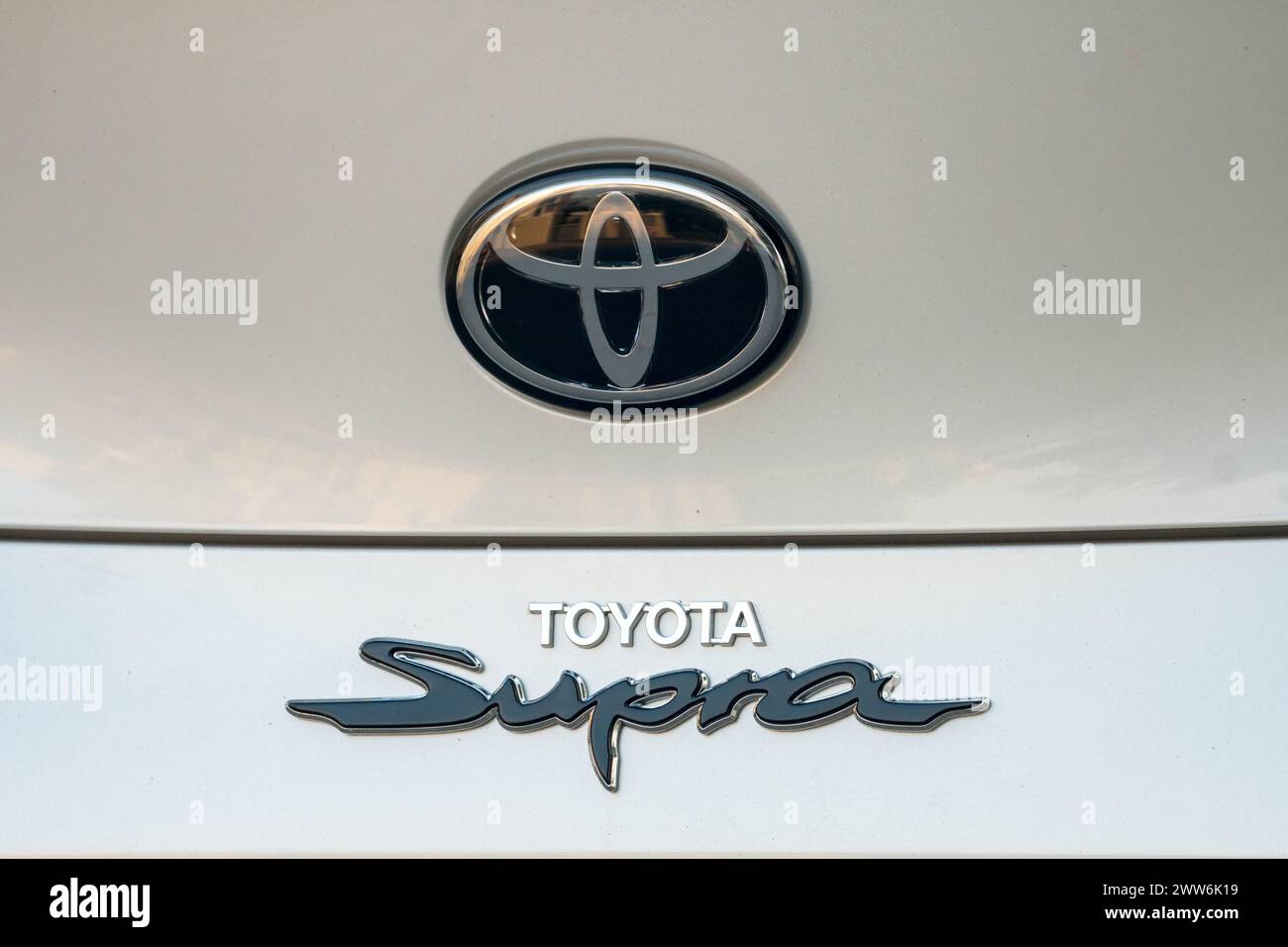 Toyota Supra logo, and metal sign or emblem on a car concept transport, transportation, motor industry, manufacturer Stock Photo