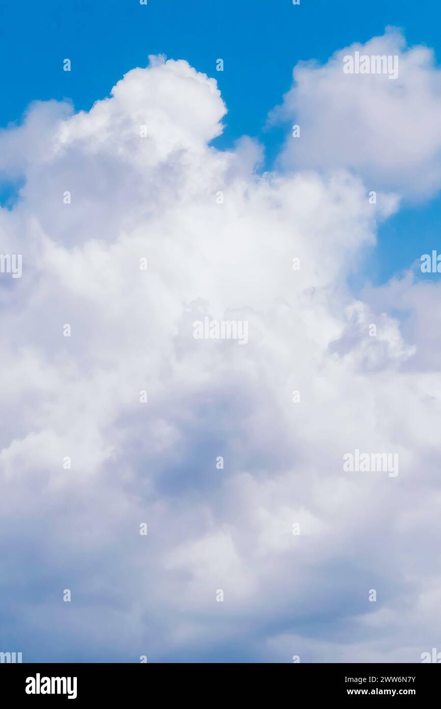 A scenic view of fluffy white clouds over Tumon Beach, Guam, USA Stock Photo