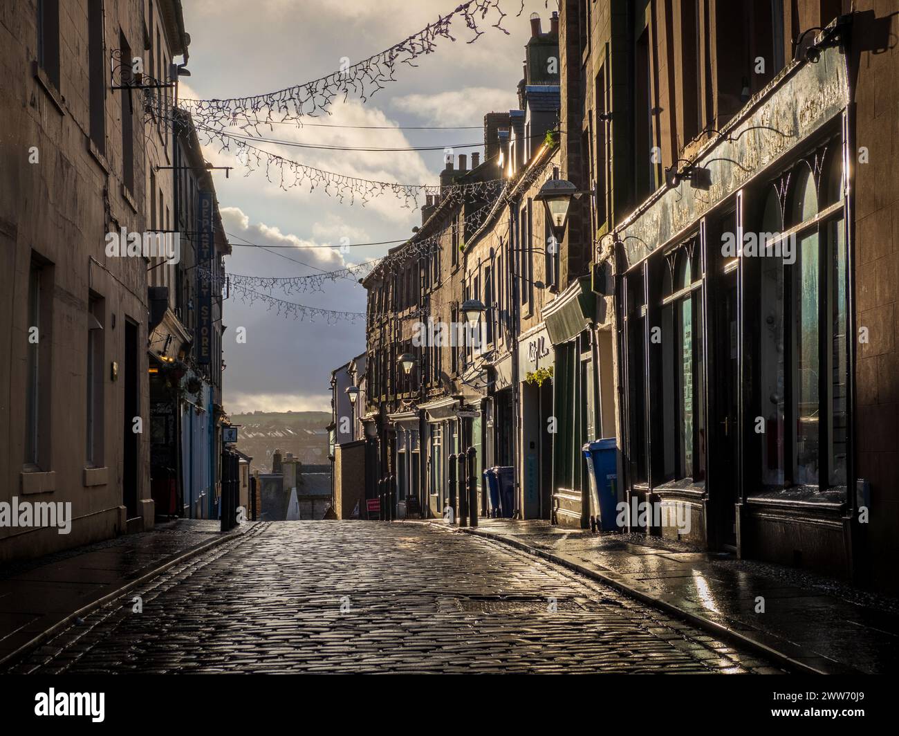 Late afternoon on a damp cobbled street in Berwick on Tweed, Northumberland Stock Photo