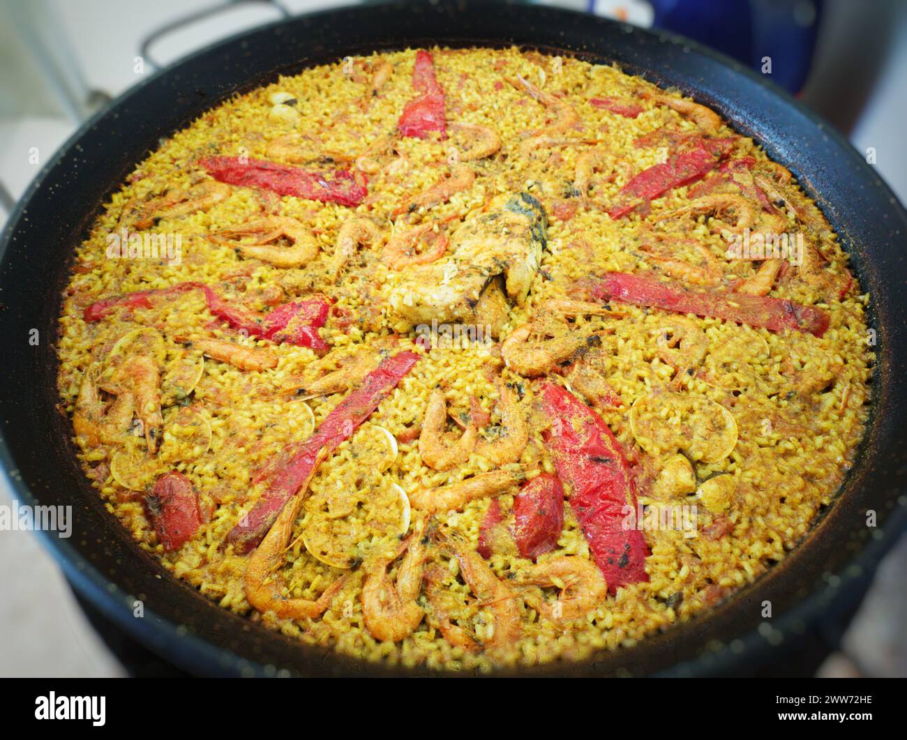 Homemade seafood rice called paella in Spain. Stock Photo