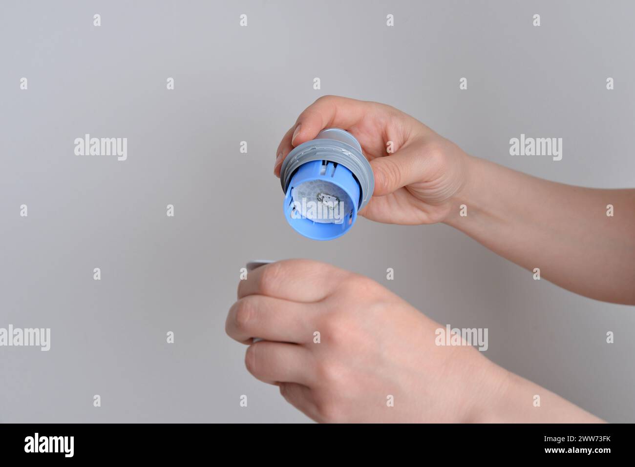 Preparation for diabetic sensor placement, measuring blood glucose levels. Medical, healthcare, diabetes management, or technology concepts. Stock Photo