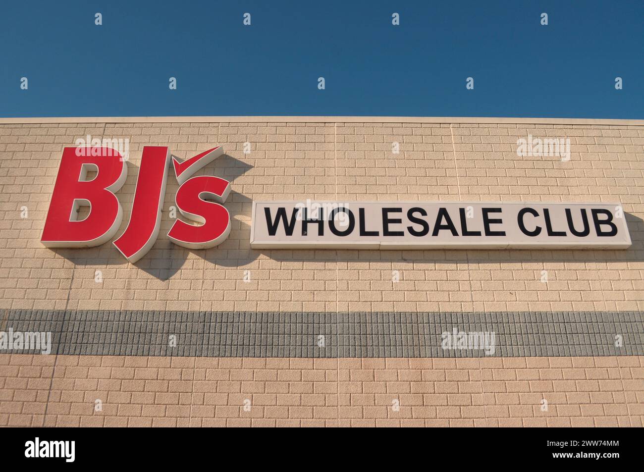 New York, United States. 21st Mar, 2024. A BJ's Wholesale Club logo is seen on a BJ's Wholesale Club store in the neighborhood of Levittown in Nassau County, Long Island, New York. Credit: SOPA Images Limited/Alamy Live News Stock Photo