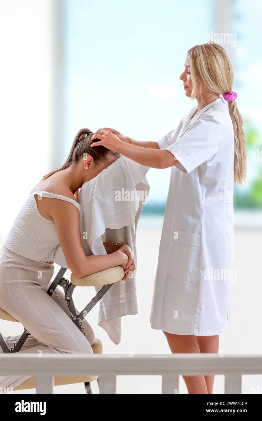 Young woman scalp massage. Stock Photo