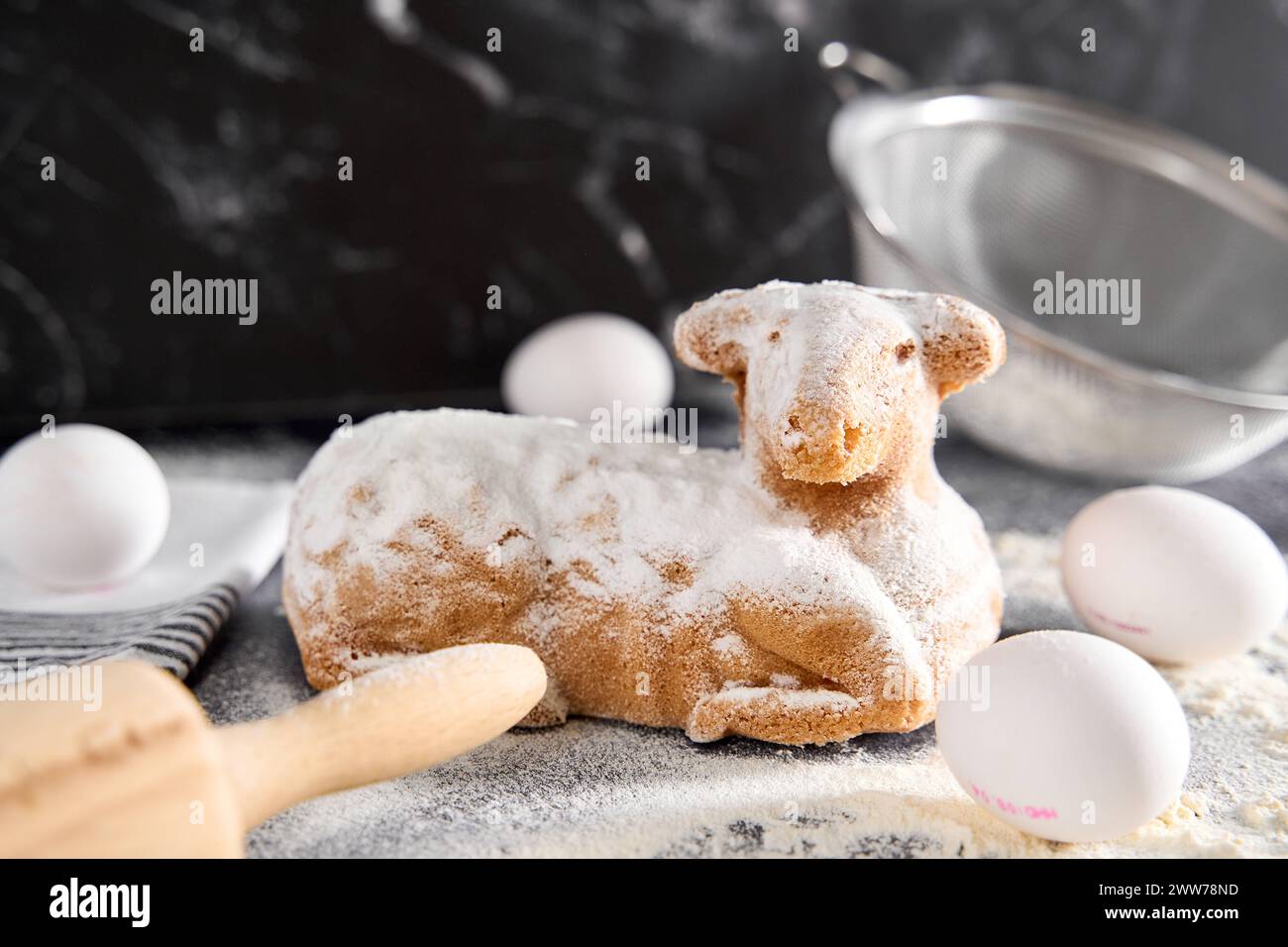 Augsburg, Bavaria, Germany - March 22, 2024: Traditional Easter lamb as a cake for Easter. Baking concept with flour, eggs *** Traditionelles Osterlamm als Kuchen zu Ostern. Backen Konzept mit Mehl, Eiern Stock Photo
