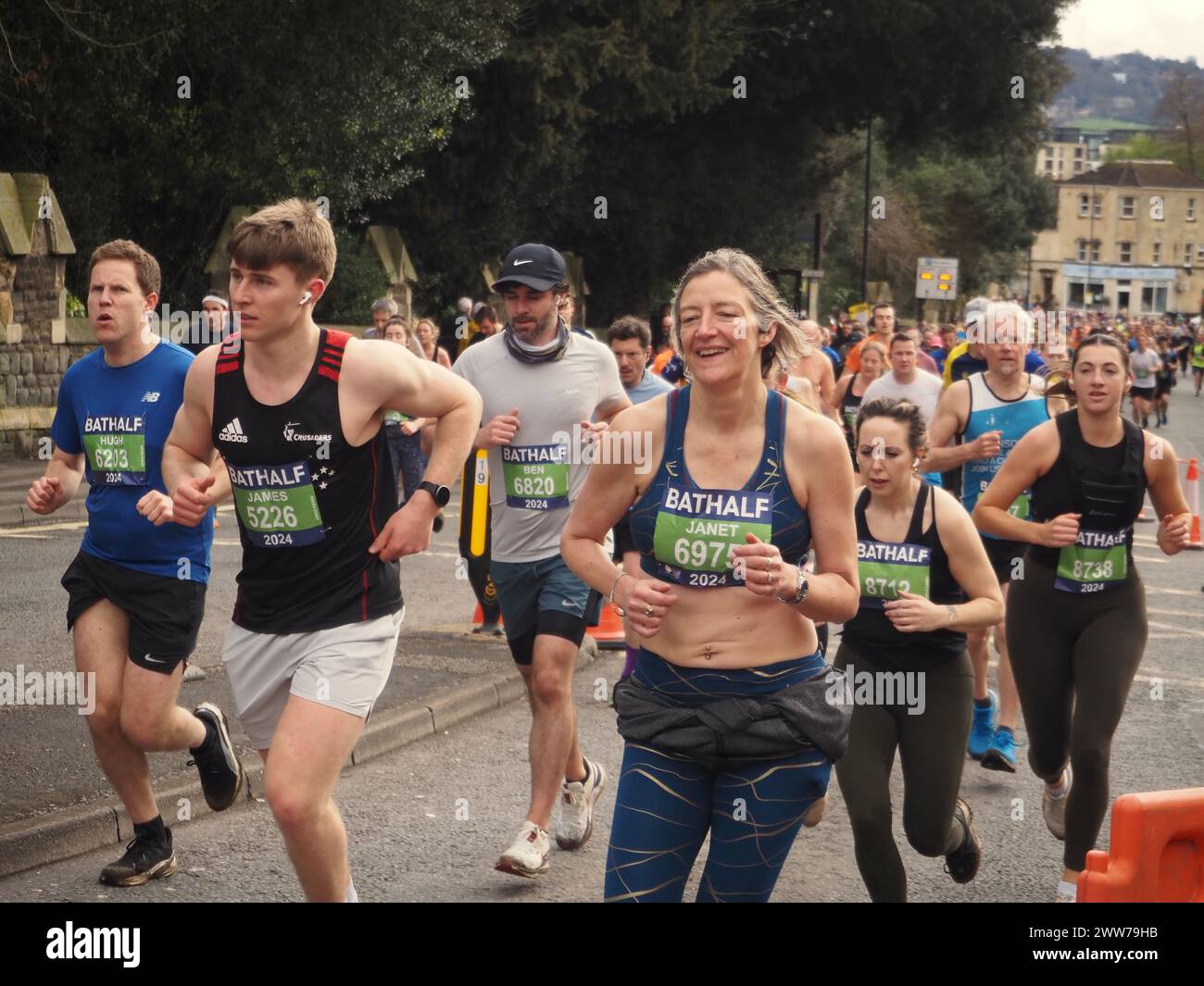 Runners taking part in the Bath Half Marathon 2024. Group view Stock ...