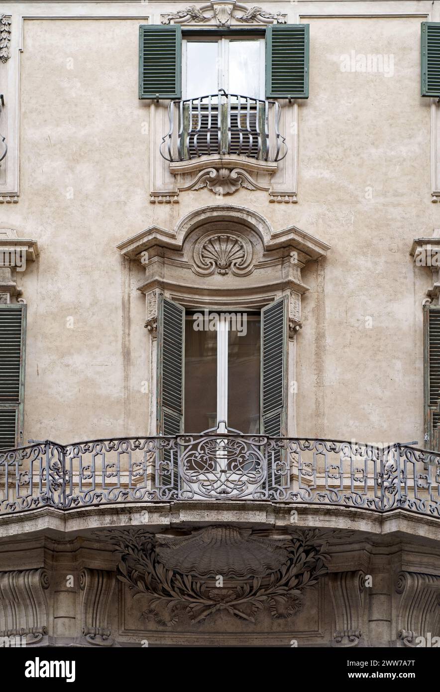 Windows of Rome. Classic old wooden windows with shutters in a public ...