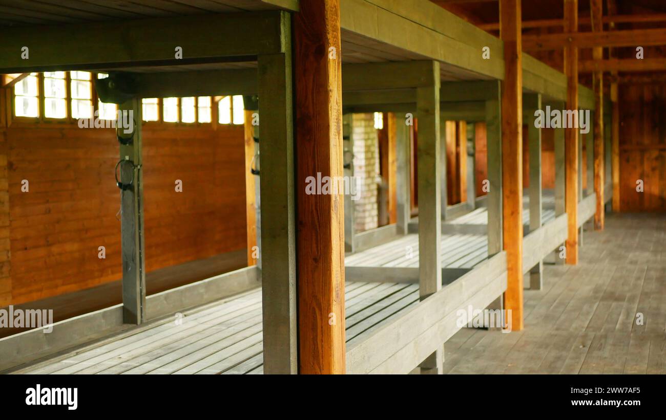Concentration camp labour Gypsy replica barrack, wooden beds and a stove memorial site view interior one wooden prisoner, Hodonin near Kunstat served Stock Photo