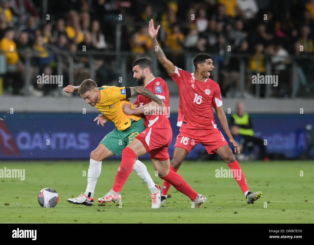 Adam Taggart (L) of Australia football team, Maher Sabra (M) and Walid Shour (R) of Lebanon football team are seen in action during the FIFA World Cup 2026 Qualifier Round 2 match between Australia and Lebanon held at the CommBank Stadium. Final score; Australia 2:0 Lebanon. (Photo by Luis Veniegra / SOPA Images/Sipa USA) Stock Photo