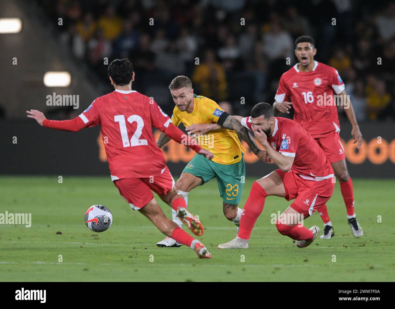 Hasan Srour (L), Maher Sabra (R) of Lebanon football team and Adam Taggart (M) of Australia football team are seen in action during the FIFA World Cup 2026 Qualifier Round 2 match between Australia and Lebanon held at the CommBank Stadium. Final score; Australia 2:0 Lebanon. (Photo by Luis Veniegra / SOPA Images/Sipa USA) Stock Photo
