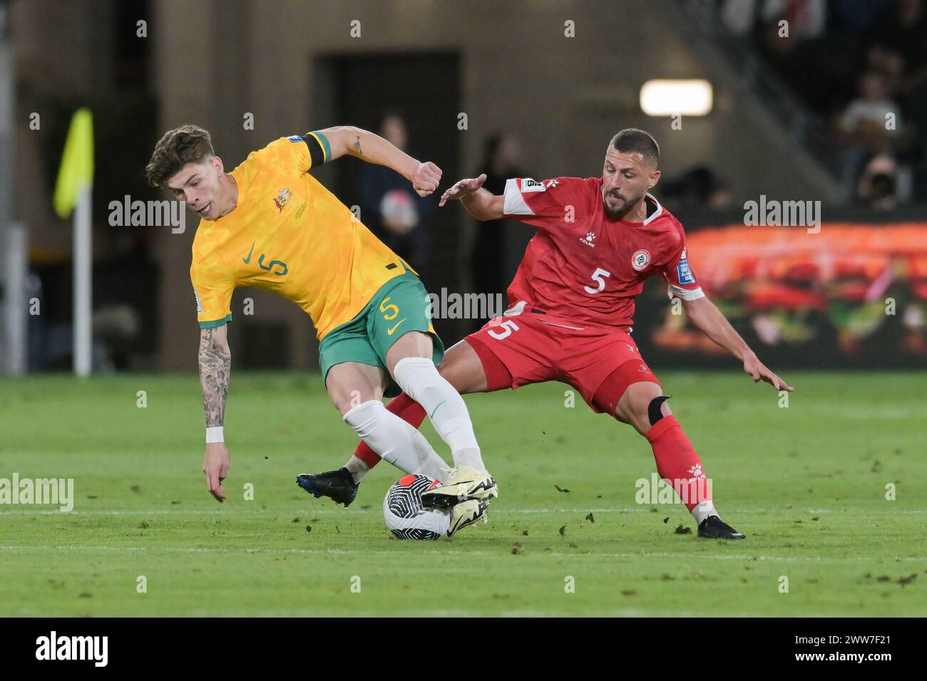 Parramatta, Australia. 21st Mar, 2024. Jordan Bos (L) of Australia football team and Nassar Nassar (R) of Lebanon football team are seen in action during the FIFA World Cup 2026 Qualifier Round 2 match between Australia and Lebanon held at the CommBank Stadium. Final score; Australia 2:0 Lebanon. Credit: SOPA Images Limited/Alamy Live News Stock Photo