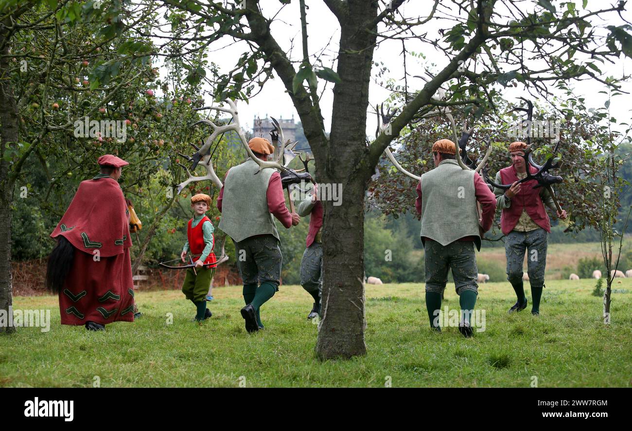 09/09/13  The Abbots Bromley Horn Dance, perform in an apple orchard in Abbots Bromley.   Dating back to the Barthelmy Fair in August 1226, it is one Stock Photo