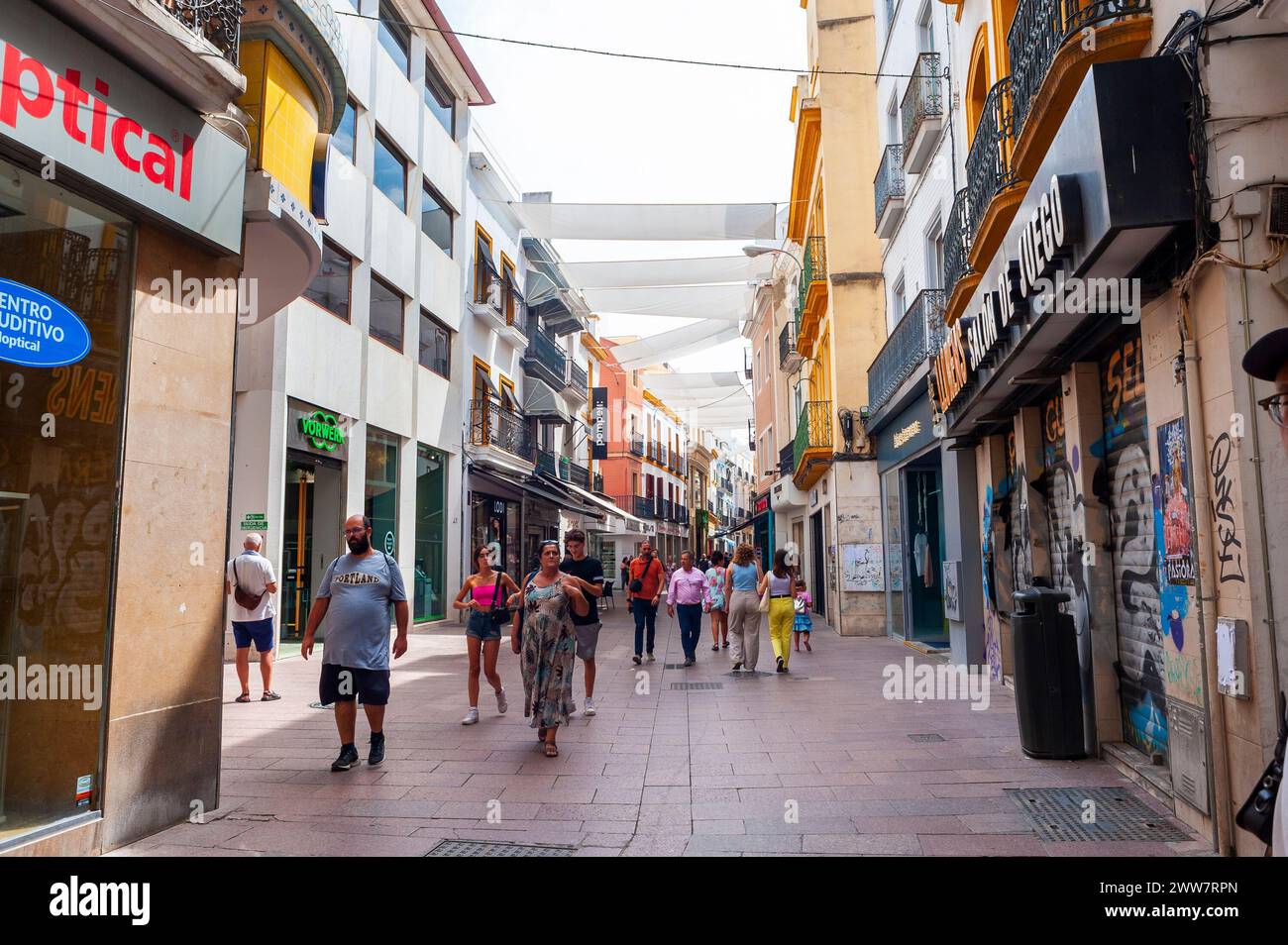 Seville, Spain, Crowd of People, Tourists, Walking, Visiting Street Scene, Historic City Center Stock Photo