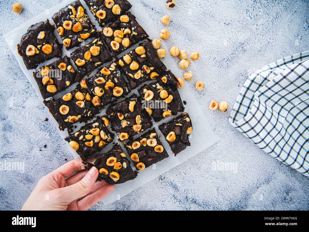 person picking brownie Stock Photo