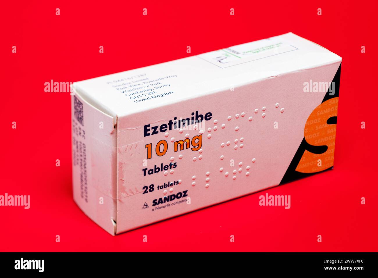 Box of 28  Ezetimibe 10mg Tablets on a Red Background Stock Photo