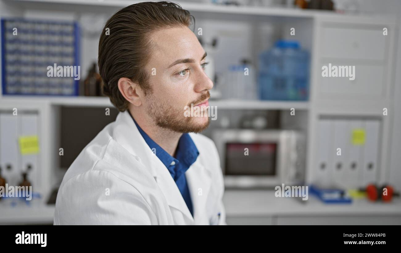 Male scientist sitting on chair hi-res stock photography and images - Alamy