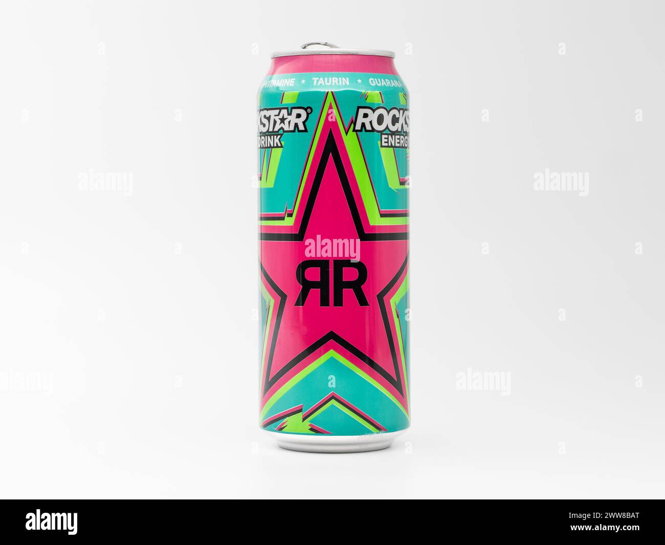Rockstar Energy Drink Sour Apple Punched flavor beverage. The shiny green can with the vibrant magenta colored star logo is a popular lifestyle drink. Stock Photo