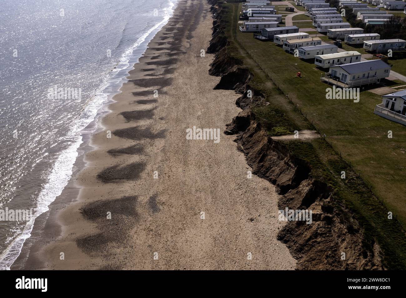 erosion of cliffs at skipsea on the east coast of yorkshire showing danger to caravan site elevated view Stock Photo