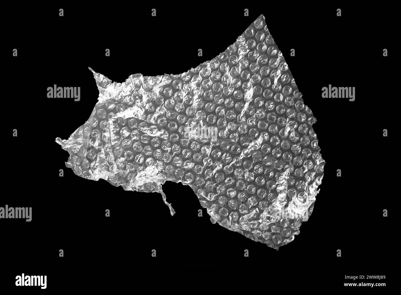 Transparent bubble wrap on black background, top view Stock Photo