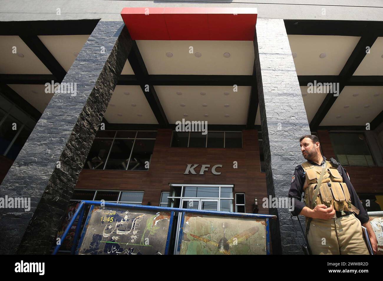 Police officials are standing high alert to avoid untoward incident outside the Kentucky Fried Chicken (KFC) restaurant branch after it was temporarily closed following protest in solidarity with the Palestinian people, in Peshawar on Friday, March 22, 2024. Stock Photo