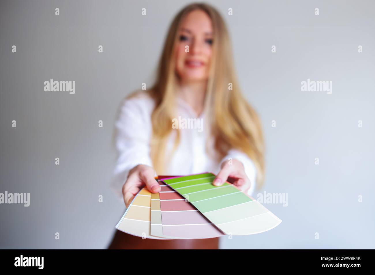 girl interior designer hold color palette, focus on a palette Stock ...