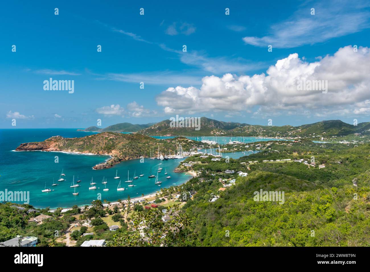 View point from above looking over the coastline of Antigua with sail ...