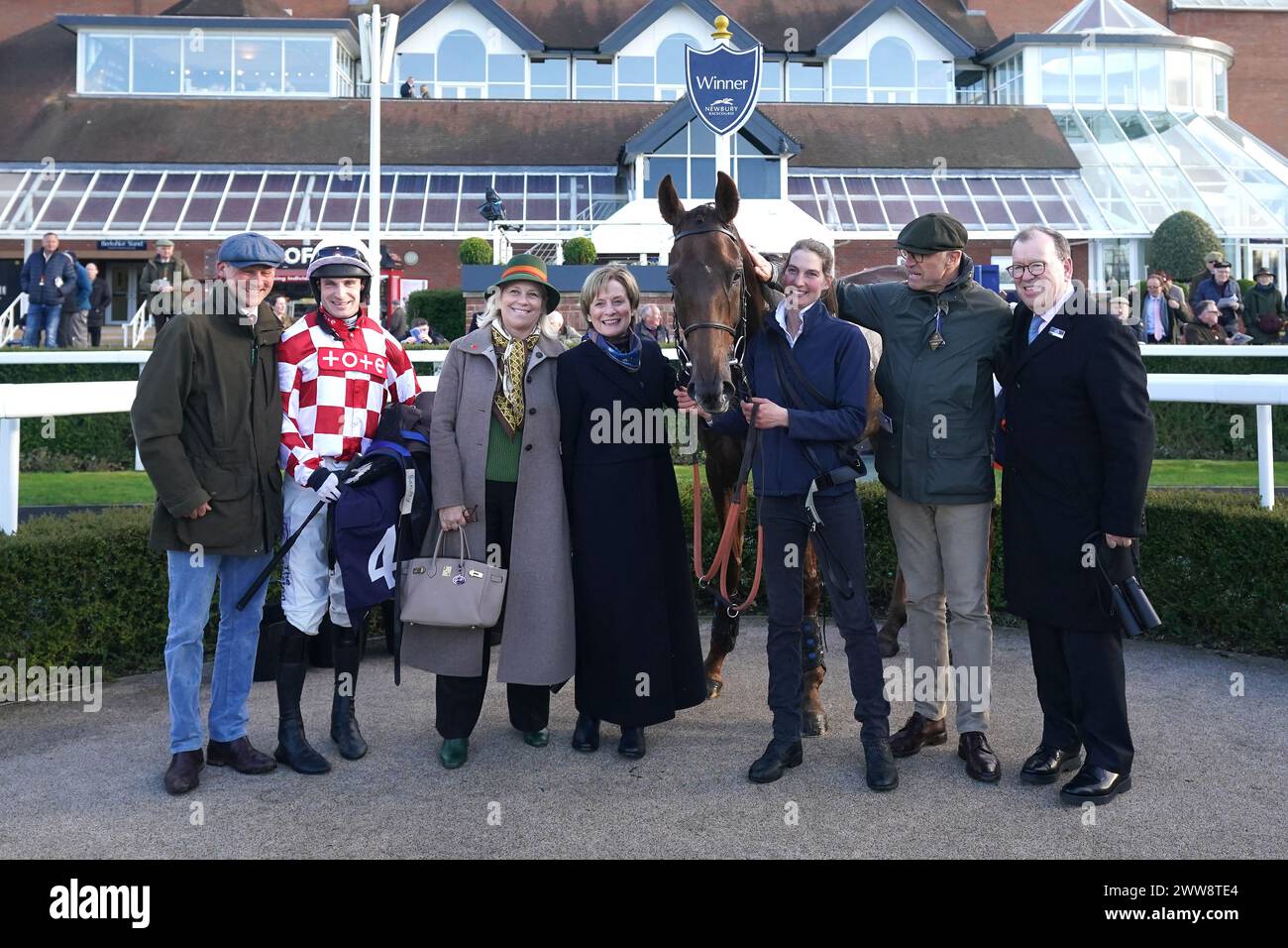 Jockey Harry Bannister second Left And Trainer Richard Bandey left jockey-harry-bannister-second-left-and-trainer-richard-bandey-left