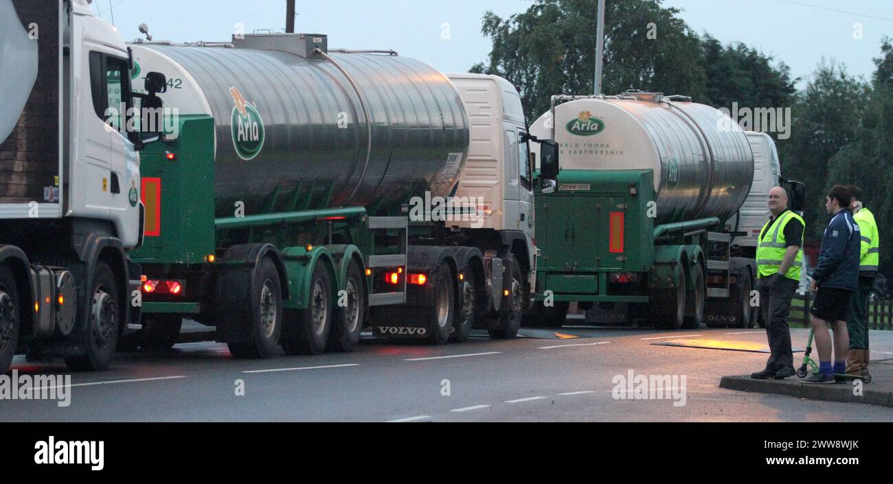 19/07/12  ***VIDEO AVAILABLE ON REQUEST***..Tankers queue outside the Arla processing plant after protestors block their path...More than 300 dairy fa Stock Photo
