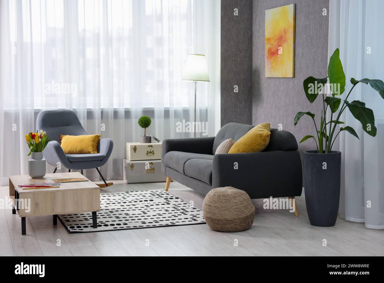 Home renovation. Room interior with stylish gray wallpaper on wall Stock Photo