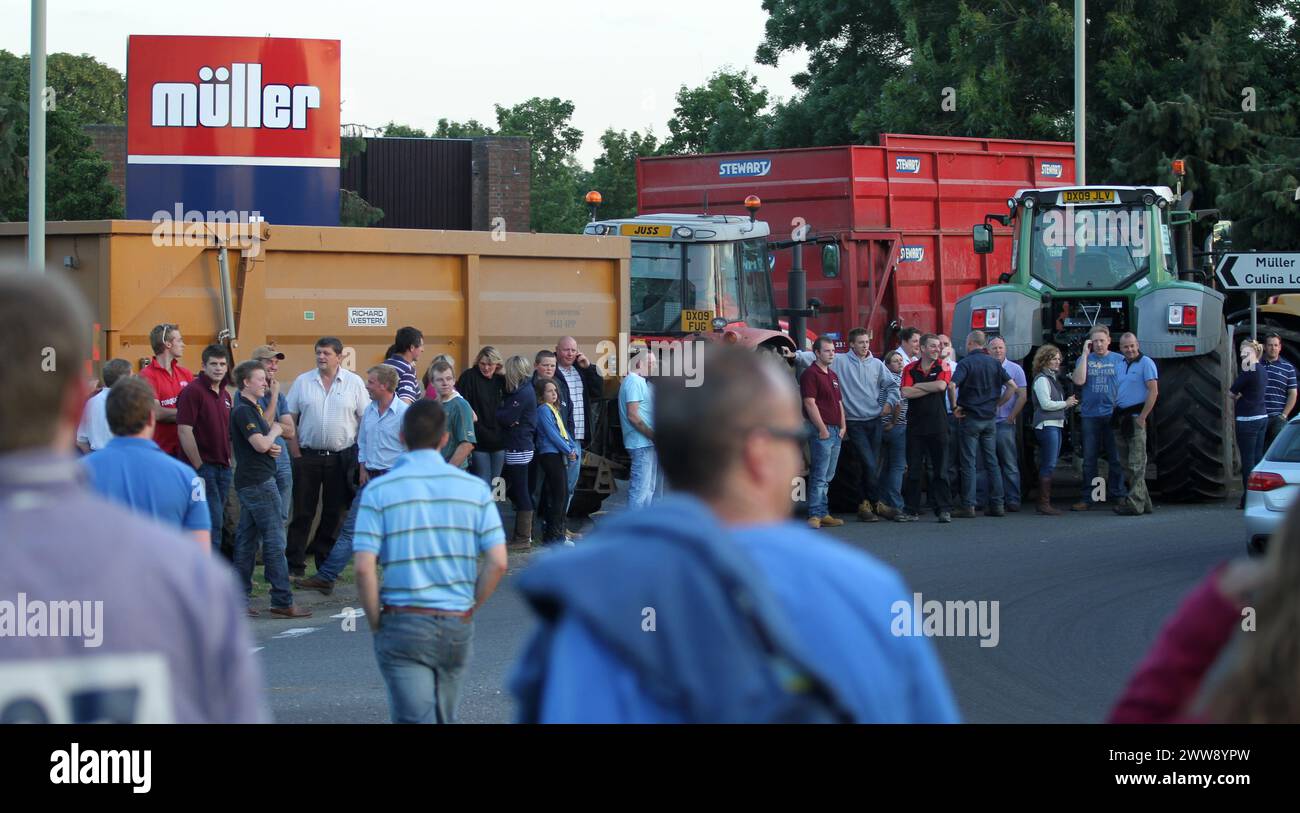 24/07/12..Farmers for Action protestors blockade the Wiseman owned Muller Dairy in Market Drayton, Shropshire demanding more money for dairy farmers.. Stock Photo