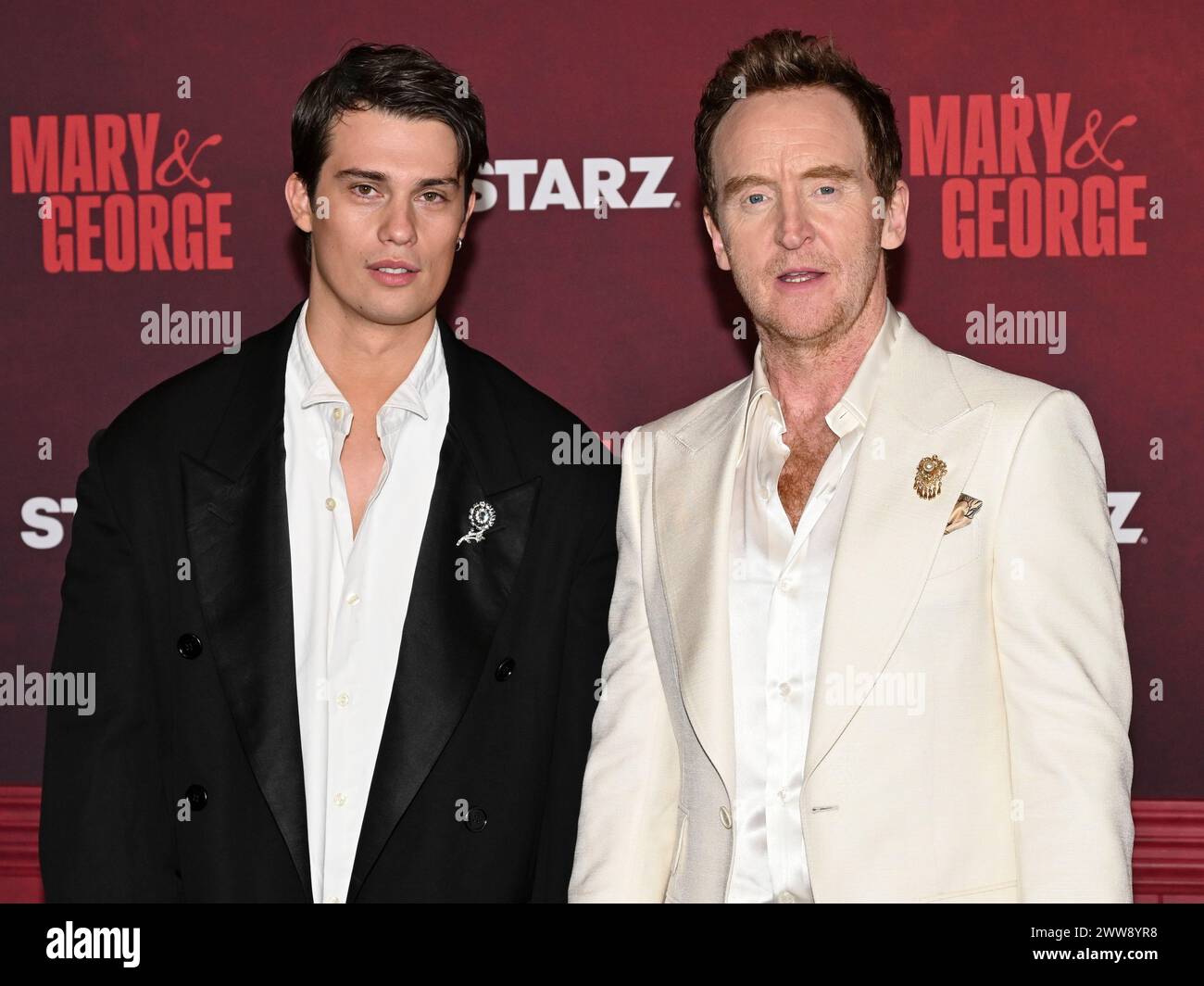 March 21, 2024, Los Angeles, California, USA: Nicholas Galitzine and Tony Curran attend the STARZ's ''Mary & George'' red carpet premiere. (Credit Image: © Billy Bennight/ZUMA Press Wire) EDITORIAL USAGE ONLY! Not for Commercial USAGE! Stock Photo